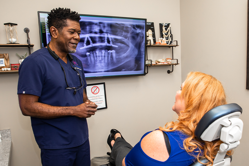 Step-by-step illustration showing the dental implant process from tooth extraction to implant placement and final restoration.