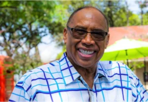 Amazing Dental Solutions patient smiling confidently after exploring dentures and implant options.